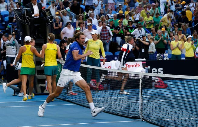 10th November 2019; RAC Arena, Perth, Western Australia, Australia; Fed Cup by BNP Paribas Final Tennis, Australia versus France; Julien Benneteau Captain of France about to jump the net after his team defeated Australia in the doubles to win the Fed Cup 3 rubbers to 2  ActionPlus12186351 DavidxWoodley