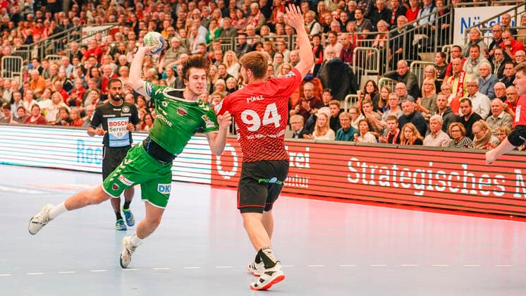10 11 2019, Euregium, Nordhorn, GER, Handball 1 Bundesliga, Men HSG Nordhorn Lingen vs Foxes Berlin, Jacob Tandrup Holm Foxes Berlin 6 vs Georg Pöhle HSG Nordhorn Lingen 94 DFL REGULATIONS PROHIBIT ANY USE OF PHOTOGRAPHS AS IMAGE SEQUENCES AND OR QUASI VIDEO Nordhorn Niedersachsen Germany Euregium