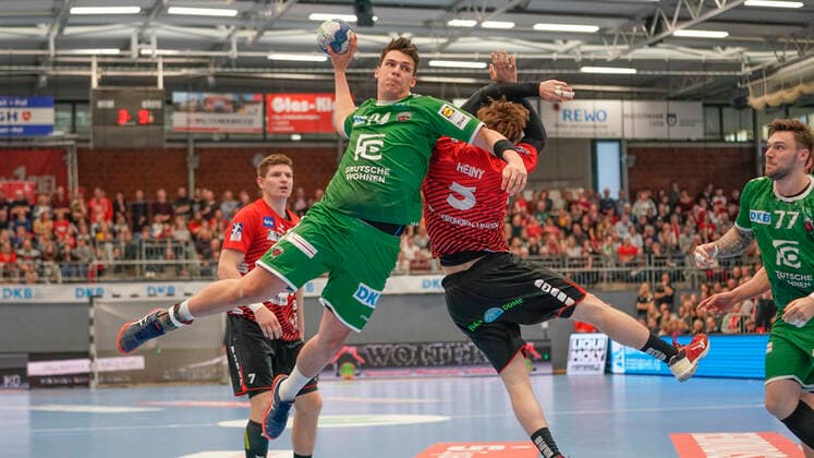 10 11 2019, Euregium, Nordhorn, GER, Handball 1 Bundesliga, Men HSG Nordhorn Lingen vs Foxes Berlin, Frederick Simak Foxes Berlin 24 vs Lutz Heiny HSG Nordhorn Lingen 5 DFL REGULATIONS PROHIBIT ANY USE OF PHOTOGRAPHS AS IMAGE SEQUENCES AND OR QUASI VIDEO Nordhorn Niedersachsen Germany Euregium