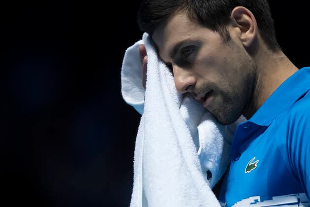 10th November 2019; 02 Arena. London, England; Nitto ATP, Tennis Herren Tennis Finals; Novak Djokovic (Serbia) wipes his face with his towel - Editorial Use  ActionPlus12186531 ShaunxBrooks