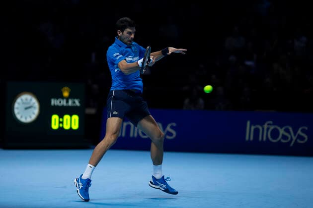 10th November 2019; 02 Arena. London, England; Nitto ATP, Tennis Herren Tennis Finals; Novak Djokovic (Serbia) with a forehand return to Matteo Berrettini (Italy) - Editorial Use  ActionPlus12186543 ShaunxBrooks