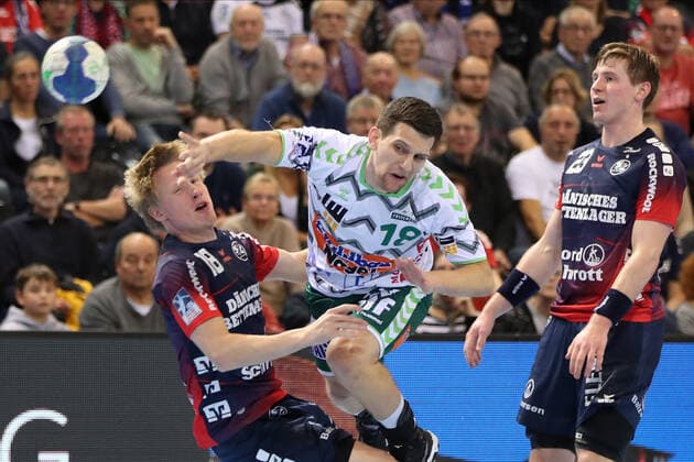 SG Flensburg Handewitt vs Frisch auf Goeppingen, LIQUI MOLY Handball Bundesliga, 10 11 19 Flensburg Josip Peric Frisch auf Goeppingen, 18 against Magnus Joendal SG Flensburg Handewitt, 18 and Goran Soegard Johannsessen SG Flensburg Handewitt, 23 Copyright: xBEAUTIFULxSPORTS MarioxM.xKobergx