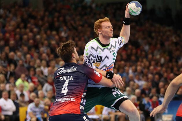 SG Flensburg Handewitt vs Frisch auf Goeppingen, LIQUI MOLY Handball Bundesliga, 10 11 19 Flensburg Nicolai Theilinger Frisch auf Goeppingen, 03 against Johannes Golla SG Flensburg Handewitt, 04 Copyright: xBEAUTIFULxSPORTS MarioxM.xKobergx