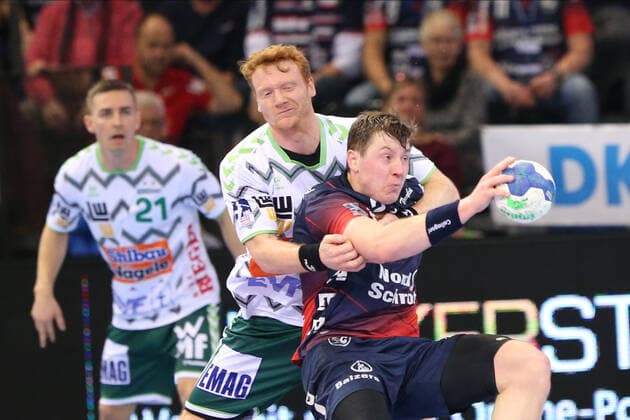 SG Flensburg Handewitt vs Frisch auf Goeppingen, LIQUI MOLY Handball Bundesliga, 10 11 19 Flensburg Goran Soegard Johannsessen SG Flensburg Handewitt, 23 against Nicolai Theilinger Frisch auf Goeppingen, 03 Copyright: xBEAUTIFULxSPORTS MarioxM.xKobergx