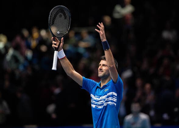 Tennis - 2019 Nitto ATP, Tennis Herren Finals at The O2 - Day One Singles Group Bjorn Borg: Novak Djokovic vs. Matteo Berrettini Novak Djokovic (Serbia) shares the divine energy at the end of the match COLORSPORT DANIEL BEARHAM  csp_ATPFls_D1_101119_