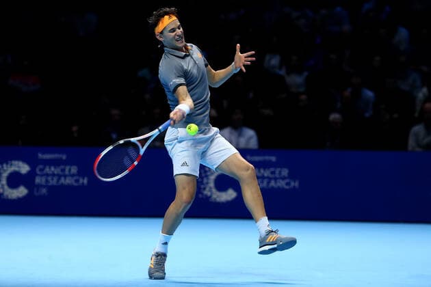 10th November 2019; 02 Arena. London, England; Nitto ATP, Tennis Herren Tennis Finals; Dominic Thiem (Austria) with a forehand return to Roger Federer (Switzerland) - Editorial Use  ActionPlus12186827 ShaunxBrooks