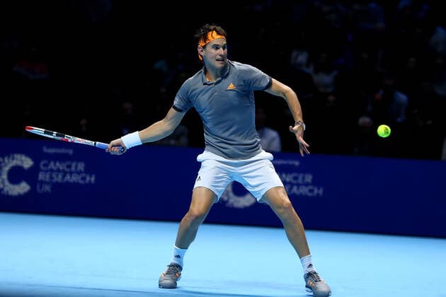10th November 2019; 02 Arena. London, England; Nitto ATP, Tennis Herren Tennis Finals; Dominic Thiem (Austria) with a forehand return to Roger Federer (Switzerland) - Editorial Use  ActionPlus12186828 ShaunxBrooks