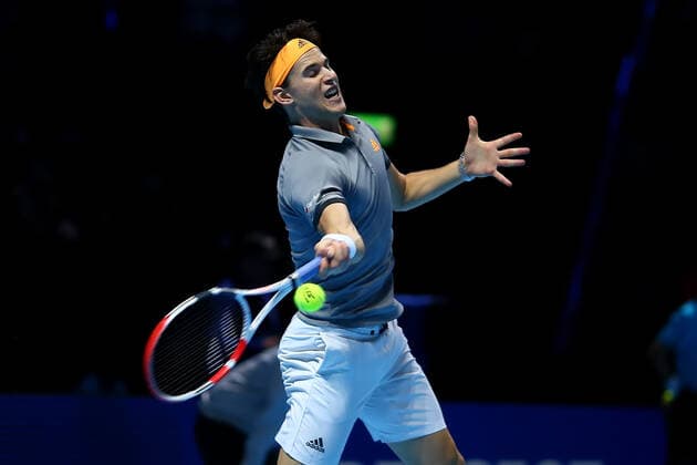 10th November 2019; 02 Arena. London, England; Nitto ATP, Tennis Herren Tennis Finals; Dominic Thiem (Austria) with a forehand return to Roger Federer (Switzerland) - Editorial Use  ActionPlus12186919 ShaunxBrooks