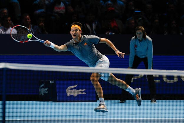 10th November 2019; O2 Arena, London, England; Nitto ATP, Tennis Herren Tennis Finals; Dominic Thiem (AUT) plays a forehand shot in his match against Roger Federer (SUI) - Editorial Use  ActionPlus12186949 HongboxChen