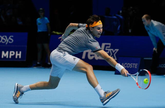 10th November 2019; O2 Arena, London, England; Nitto ATP, Tennis Herren Tennis Finals; Dominic Thiem (AUT) plays a backhand shot in his match against Roger Federer (SUI) - Editorial Use  ActionPlus12186950 HongboxChen
