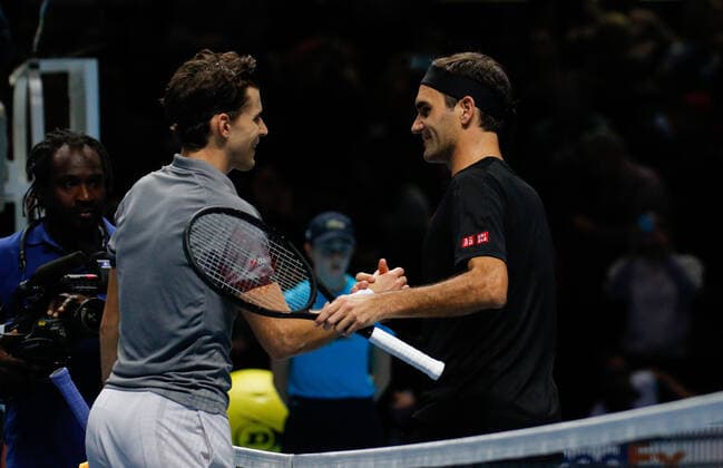 10th November 2019; O2 Arena, London, England; Nitto ATP, Tennis Herren Tennis Finals; Dominic Thiem (AUT) shakes hands with Roger Federer (SUI) - Editorial Use  ActionPlus12186966 HongboxChen