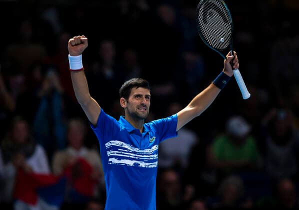 Sport Bilder des Tages (191111) -- LONDON, Nov. 11, 2019 -- Novak Djokovic of Serbia celebrates after winning the singles group match against Matteo Berrettini of Italy at the ATP, Tennis Herren World Tour Finals 2019 in London, Britain on Nov. 10, 2019. ) (SP)BRITAIN-LONDON-TENNIS-ATP FINALS-DAY 1 HanxYan 
