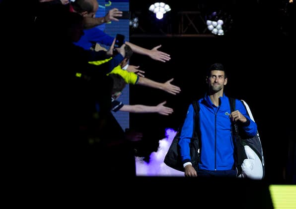 (191111) -- BEIJING, Nov. 11, 2019 -- Novak Djokovic of Serbia enters the court before the singles group match against Matteo Berrettini of Italy at the ATP, Tennis Herren World Tour Finals 2019 in London, Britain on Nov. 10, 2019. ) XINHUA PHOTOS OF THE DAY HanxYan 