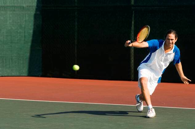 Tennis Player Hitting Backhand 03B77661