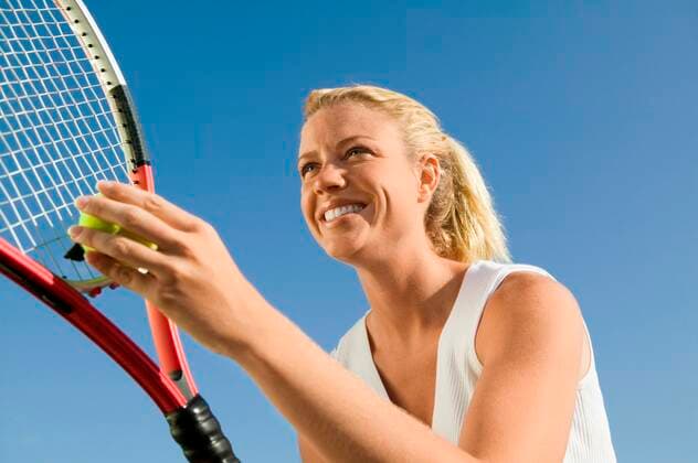 Woman Playing Tennis 03B79625