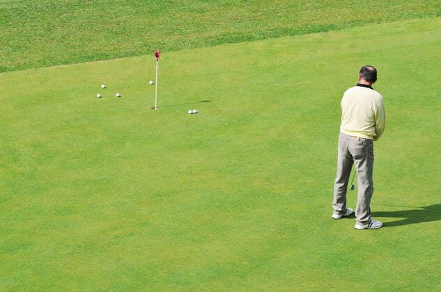 golf ball on sports golf course and hole ING_32193_38602