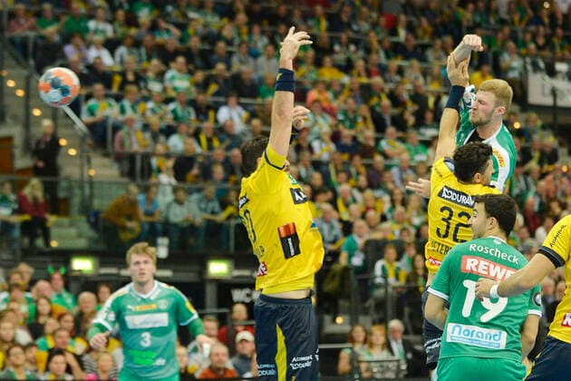 1 Handball Bundesliga 2019 2020, match 1 13 112, 13 matchday, SC DHfK Leipzig vs. Rhein Neckar Löwen 14 11 2019 Goalscoring Philipp Weber Backraumspieler DHfK Leipzig, back number 20 top right against Gedeon Guardiola Kreislaufufer Rhein Neckar Loewen, back number 30 middle and Alexander Petersson backspace player Rhein Neckar Loewen, back number 32 right at handball Bundesliga game Leipzig vs. Rhein Neckar Löwen 14 11 2019 Leipzig Sachsen Deutschland Arena Leipzig Am Sportforum 2