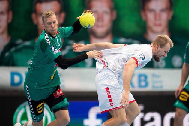 Minden, Germany 14 11 2019 1 Handball Bundesliga 2019 2020 GWD Minden vs. MT Melsungen L R Christoffer Rambo Minden , Julius Kühn Melsungen Minden North Rhine-Westphalia Germany Kampa Halle
