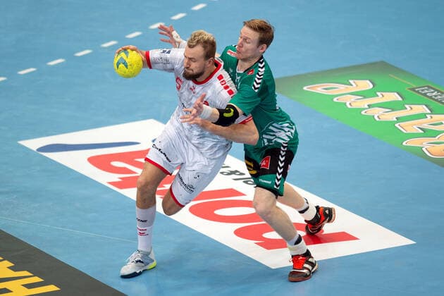 Minden, Germany 14 11 2019 1 Handball Bundesliga 2019 2020 GWD Minden vs MT Melsungen L R Julius Kühn Melsungen , Magnus Gullerud Minden Minden North Rhine-Westphalia Germany Kampa Halle