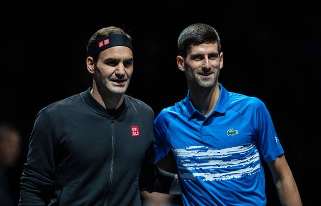 Sport Themen der Woche KW46 (191115) -- LONDON, Nov. 15, 2019 -- Novak Djokovic (R) of Serbia and Roger Federer of Switzerland pose for photos before their singles group match at the ATP, Tennis Herren World Tour Finals 2019 in London, Britain on Nov. 14, 2019. ) (SP)BRITAIN-LONDON-TENNIS-ATP FINAL-DAY 5 HanxYan 