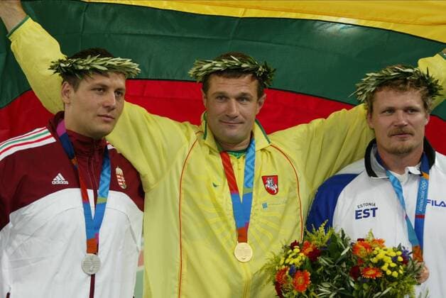Virgillijus Alekna, Robert Fazekas &amp; Aleksander Tammert Mens Discus Mens Discus Athens, Greece 24 August 2004  Copyright: MaryxEvansxAllstarxPaulxMcfegan 12153410