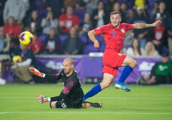 ORLANDO, FL - NOVEMBER 15: the United States forward Jordan Morris (11) beats Canada goalkeeper Milan Borjan (18) and makes a pass for an goal assist by the the United States forward Gyasi Zardes (9) during the CONCACAF Nations League soccer match between the Canada and United States on November 15, 2019 at Explorer Stadium in Orlando, FL. (Photo by Andrew Bershaw Icon Sportswire) SOCCER: NOV 15 CONCACAF Nations League - USA v Canada Icon1911150190