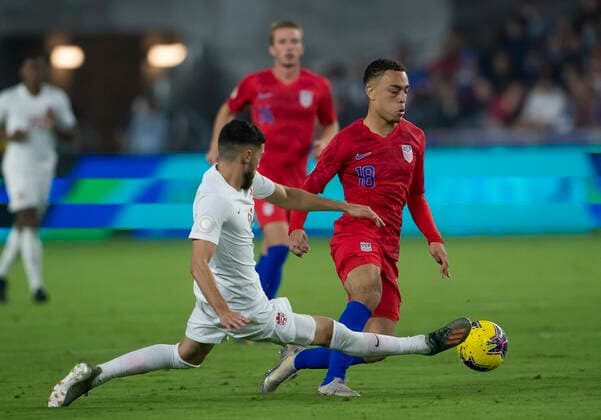 ORLANDO, FL - NOVEMBER 15: Canada midfielder Jonathan Osorio (21) blocks the pass of the United States defender Sergino Dest (18) CONCACAF Nations League soccer match between the Canada and United States on November 15, 2019 at Explorer Stadium in Orlando, FL. (Photo by Andrew Bershaw Icon Sportswire) SOCCER: NOV 15 CONCACAF Nations League - USA v Canada Icon1911150414