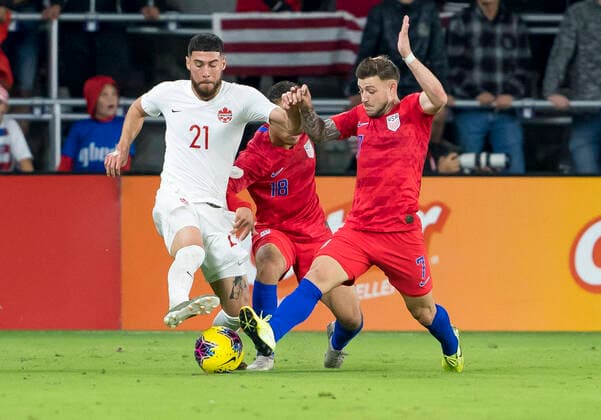 ORLANDO, FL - NOVEMBER 15: Canada midfielder Stephen Eustaquio (7)and Canada midfielder Jonathan Osorio (21) challenge for possession during the CONCACAF Nations League soccer match between the Canada and United States on November 15, 2019 at Explorer Stadium in Orlando, FL. (Photo by Andrew Bershaw Icon Sportswire) SOCCER: NOV 15 CONCACAF Nations League - USA v Canada Icon1911150508