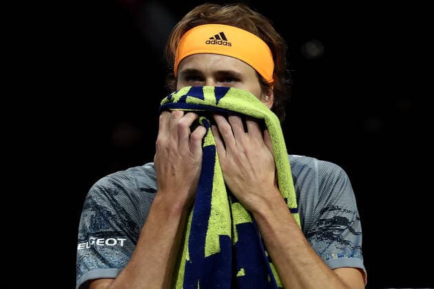 16th November 2019; 02 Arena. London, England; Nitto ATP, Tennis Herren Tennis Finals; Alexander Zverev (Germany) hides behind his towel after throwing his racket - Editorial Use  ActionPlus12188910 ShaunxBrooks