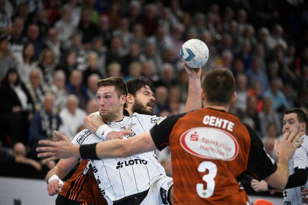 Harald Reinkind THW Kiel against Evgeni Pevnov TSV Hannover Burgdorf , Handball Bundesliga, Liqui Moly HBL, Men, 13 Matchday, TSV Hannover Burgdorf , 17 11 19 Kiel Sparkassen Arena Schleswig Holstein Germany