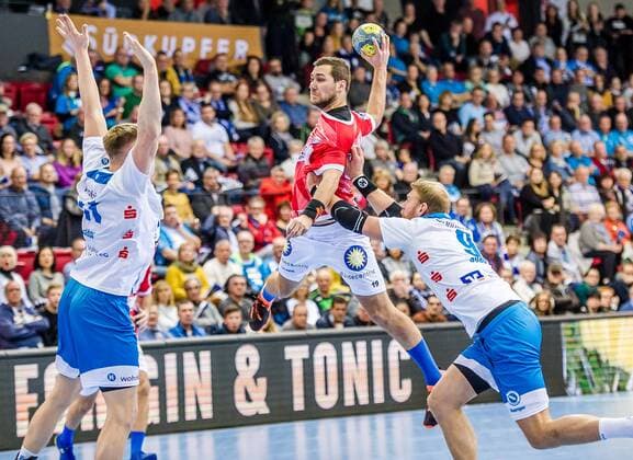 Loenn, Adam TVB Stuttgart 11 Tomas Babak Bergischer HC 19 Spaeth, Manuel TVB Stuttgart 9 at the match in the Handball Bundesliga, TVB 1898 Stuttgart Bergischer HC Stuttgart 17 11 19 Handball 13 Spieltag , Stuttgart Baden Wuerttemberg Germany