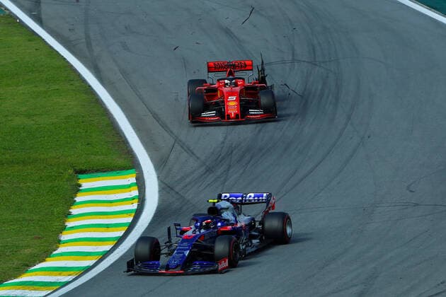 17th November 2019; Autodromo Jose Carlos Pace, Sao Paulo, Brazil; Formula One Brazil Grand Prix, Race Day; Sebastian Vettel (GER) Scuderia Ferrari SF90 as Pierre Gasly (FRA) Red Bull Racing RB15 passes him - Editorial Use  ActionPlus12189358 HeulerxAndrey