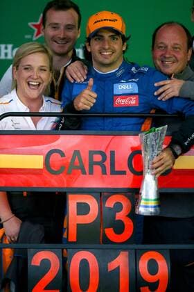 Spanish driver Carlos Sainz (c) of McLaren celebrates after running the Brazilian Grand Prix of Formula One at the Interlagos circuit in Sao Paulo, Brazil, 17 November 2019. Sainz won his first Formula One podium on Sunday in the Brazilian Grand Prix on Sunday after a sanction against British Lewis Hamilton of Mercedes. Formula One Grand Prix of Brazil !ACHTUNG: NUR REDAKTIONELLE NUTZUNG!  Copyright: xMarceloxMachadoxDexMelox AME6373 20191117-637096276244533964
