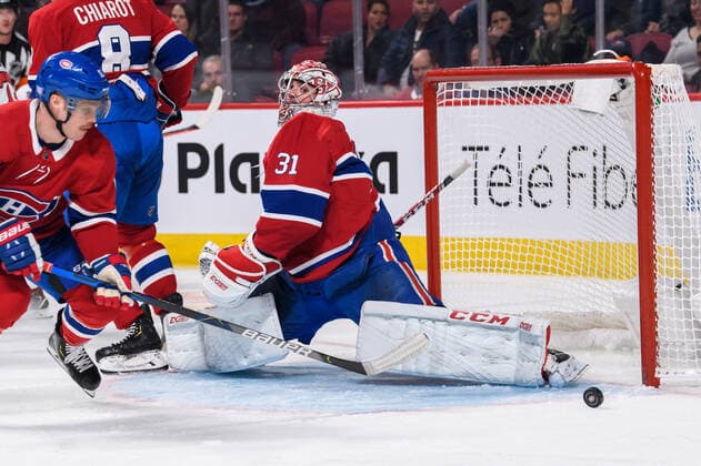 MONTREAL, QC - NOVEMBER 20: Carey Price (31) of the Montreal Canadiens makes a pad save during the third period of the NHL, Eishockey Herren, USA game between the Ottawa Senators and the Montreal Canadiens on November 20, 2019, at the Bell Centre in Montreal, QC (Photo by Vincent Ethier Icon Sportswire) NHL: NOV 20 Senators at Canadiens Icon1911201941