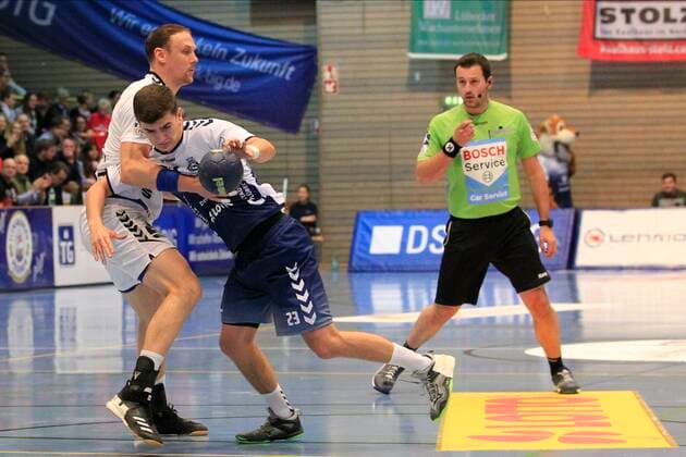 2 Bundesliga Handball VfL Luebeck Schwartau EHV Aue 21 11 2019, Hansehalle Luebeck, GER, 2 Bundesliga Handball VfL Luebeck Schwartau EHV Aue in picture picture shows Janik Schrader VfL Luebeck Schwartau stopped by Kevin Roch EHV Aue nordphotox xTauchnitz nph00059