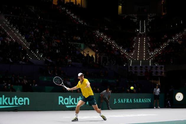 John Millman of Australia plays a forehand against Vasek Pospisil of Canada during Day 4 of the 2019 Davis Cup at La Caja Magica on November 21, 2019 in Madrid, Spain.  (20191121852)