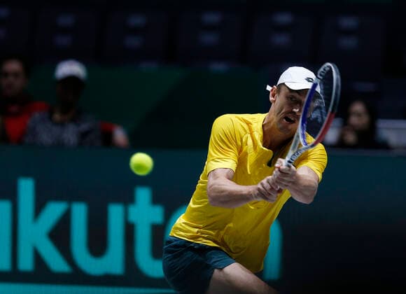 John Millman of Australia plays a backhand against Vasek Pospisil of Canada during Day 4 of the 2019 Davis Cup at La Caja Magica on November 21, 2019 in Madrid, Spain.  (20191121824)