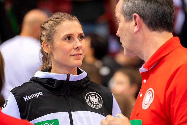 Stuttgart, Germany 21 November 2019 EHF Women Test match Germany vs Montenegro Alicia Stolle Germany Thueringer HC in conversation with coach Henk Groener Germany Stuttgart Scharrena Germany