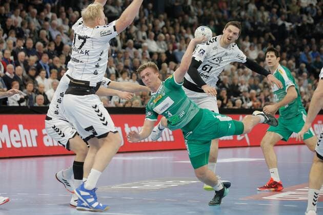 1 Handball Bundesliga THW Kiel SC DHfK Leipzig, Kiel, 24 11 2019 Franz Semper Leipzig, 3 in throw against Patrick Wiencek Kiel, 17 and Hendrik Pekeler Kiel, 61 Copyright: xBEAUTIFULxSPORTS DRPx