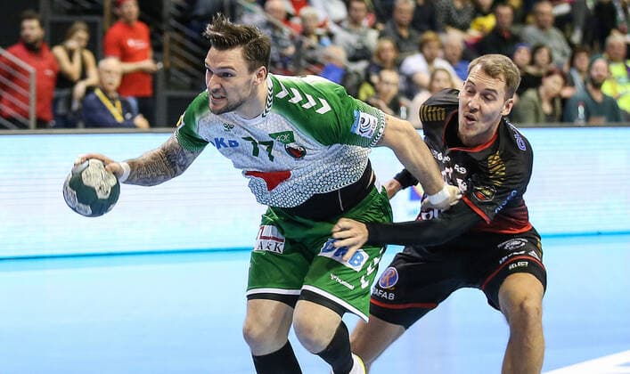 24 11 2019, Berlin, Handball, EHF Cup, 3 Round, 6 Matchday, Return match, Max Schmeling Halle, Foxes Berlin vs. HK Malmö Berlins Johan Koch l sets against Malmös defence by Foxes Berlin HK Malmö