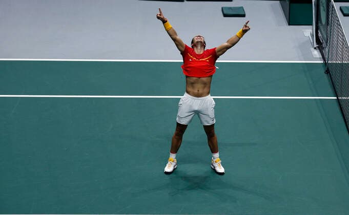 {persons} celebrates victory after his singles match against against {featuredorgname} during Final, Day 7 of the 2019 Davis Cup at La Caja Magica in Madrid, Spain.  (20191124750)