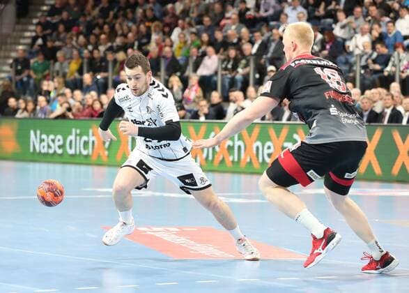 28 11 2019 Handball 1 Bundesliga LIQUI MOLY HBL Season 2019 2020 15 Matchday HC Erlangen Nuremberg Metropolitan Region HCE THW Kiel DaMa Miha Zarabec 24, THW Kiel Sebastian Firnhaber 18, HC Erlangen HCE