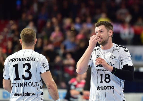 28 11 2019 Handball 1 Bundesliga Liqui Moly HBL Season 2019 2020 15 Matchday HC Erlangen Nuremberg Metropolitan Region HCE THW Kiel OGo Steffen Weinhold 13, THW Kiel Niclas Ekberg 18, THW Kiel disappoints disappointment