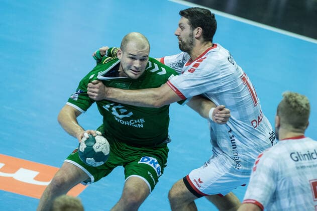 Paul Drux GER 95 Füchse Berlin sits down at the penalty area by action game scene landscape horizontal horizontal event event Füchse Berlin vs MT Melsungen HBL Handball Bundesliga 2019 20 15 game day location location Max Schmeling Halle Berlin Germany Europe Date Date 28 11 2019 Stiehl Photography