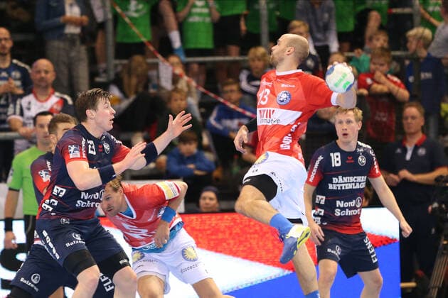 SG Flensburg Handewitt vs. Bergischer HC, LIQUI MOLY Handball Bundesliga, 28 11 19 Flensburg Kristian Nippes Bergischer HC, 13 against Goran Soegard Johannsessen SG Flensburg Handewitt, 23 Copyright: xBEAUTIFULxSPORTS MarioxM.xKobergx