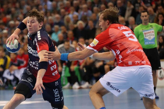 SG Flensburg Handewitt vs. Bergischer HC, LIQUI MOLY Handball Bundesliga, 28 11 19 Flensburg Goran Soegard Johannsessen SG Flensburg Handewitt, 23 against Max Darj Bergischer HC, 05 Copyright: xBEAUTIFULxSPORTS MarioxM.xKobergx