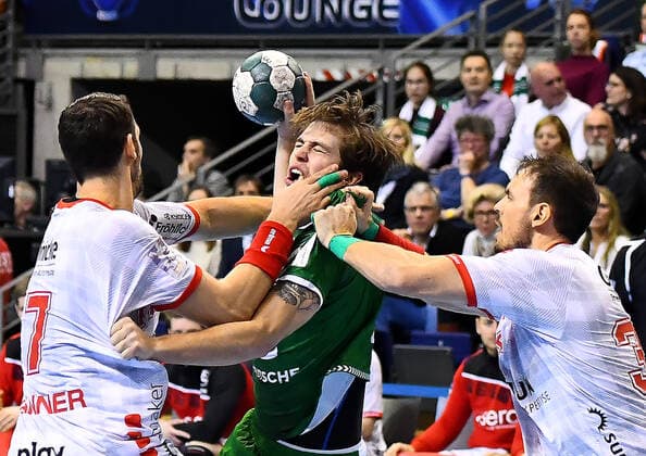 28 11 2019, xlakx, Handball Bundesliga, Fuechse Berlin MT Melsungen emspor, v l on ball Jacob Tandrup Holm Fuechse Berlin 6 ,Kai Haefner MT Melsungen 34 Berlin