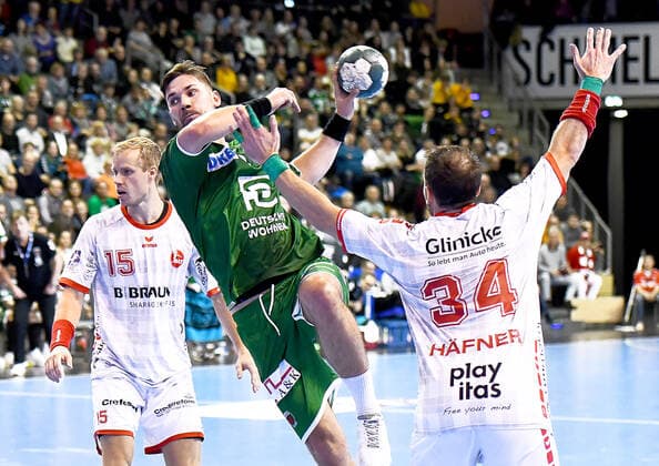 28 11 2019, xlakx, Handball Bundesliga, Fuechse Berlin MT Melsungen emspor, v lasse Mikkelsen MT Melsungen 15, to the jump throw Fabian Wiede Fuechse Berlin 3, Kai Haefner MT Melsungen 34 Berlin