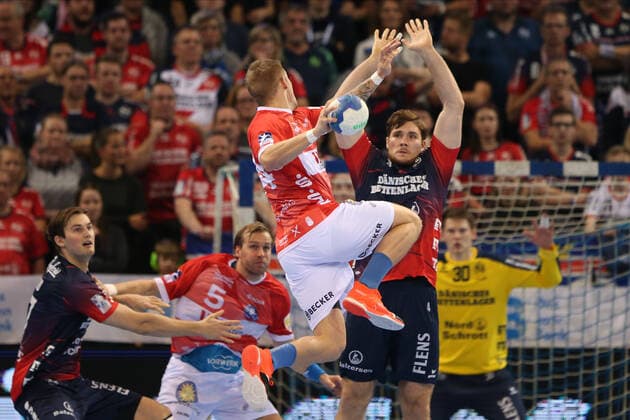 SG Flensburg Handewitt vs. Bergischer HC, LIQUI MOLY Handball Bundesliga, 28 11 19 Flensburg Linus Arnesson Bergischer HC, 24 against Johannes Golla SG Flensburg Handewitt, 04 Copyright: xBEAUTIFULxSPORTS MarioxM.xKobergx