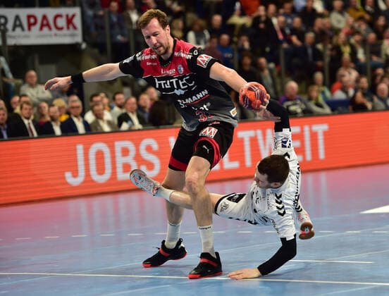 28 11 2019 Handball 1 Bundesliga Liqui Moly HBL Season 2019 2020 15 Matchday HC Erlangen Metropolitan Region Nuremberg HCE THW Kiel OGo Nikolai Link 33, HC Erlangen HCE Miha Zarabec 24, THW Kiel